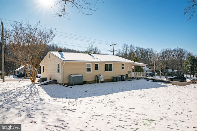 view of snow covered property