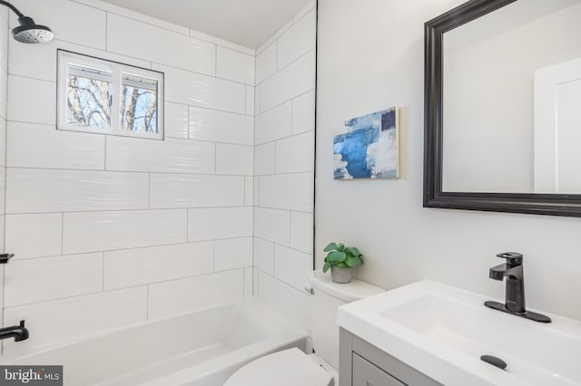 bathroom with vanity, shower / tub combination, and toilet