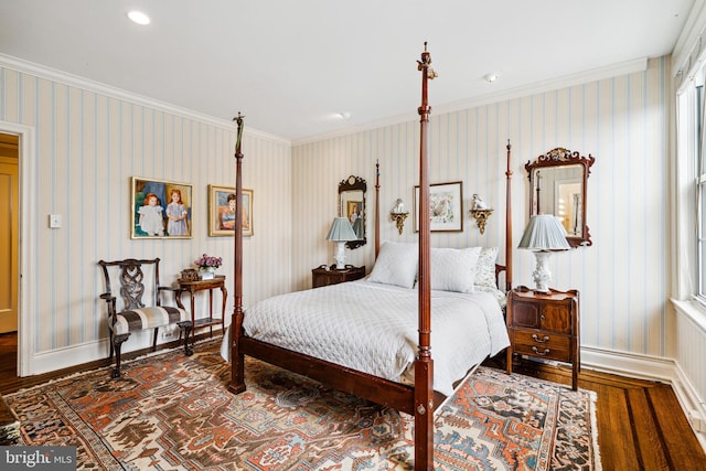 bedroom featuring crown molding and wood-type flooring