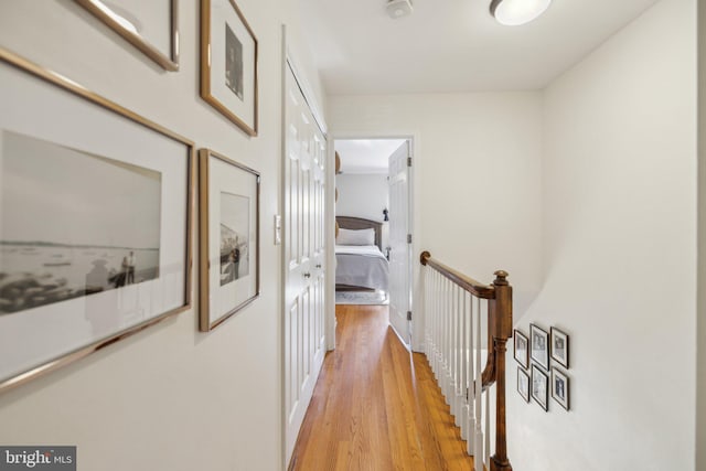 hall with light wood-type flooring