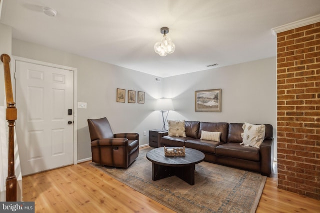 living room with light hardwood / wood-style flooring