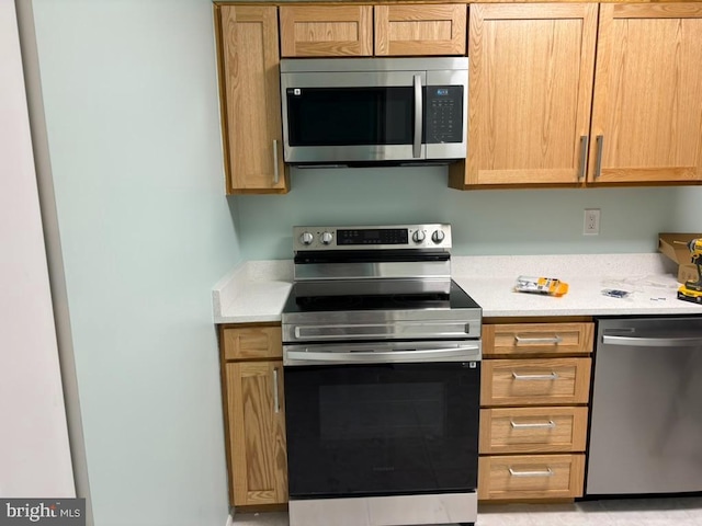 kitchen with appliances with stainless steel finishes