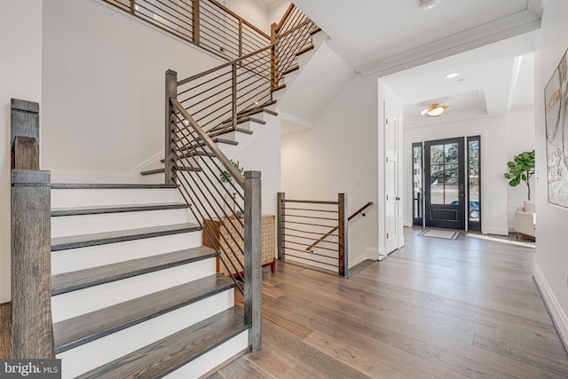 foyer entrance with hardwood / wood-style floors