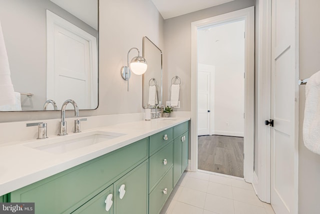 bathroom with vanity and tile patterned flooring