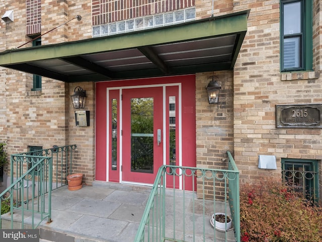 2615 4th St NE Unit 303, Washington, DC 20002 - doorway to property featuring a porch and brick siding
