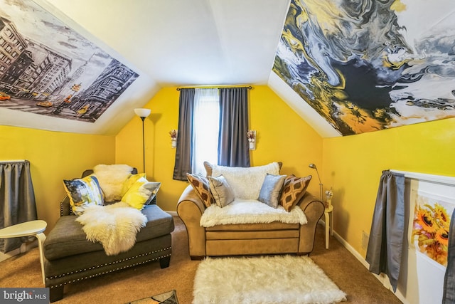 living area with lofted ceiling and carpet floors