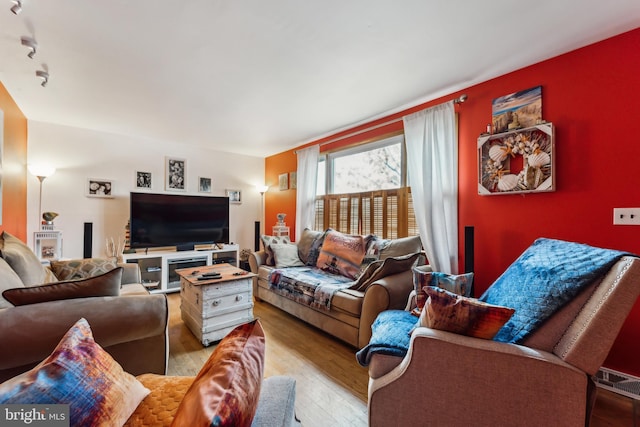 living room with light wood-type flooring