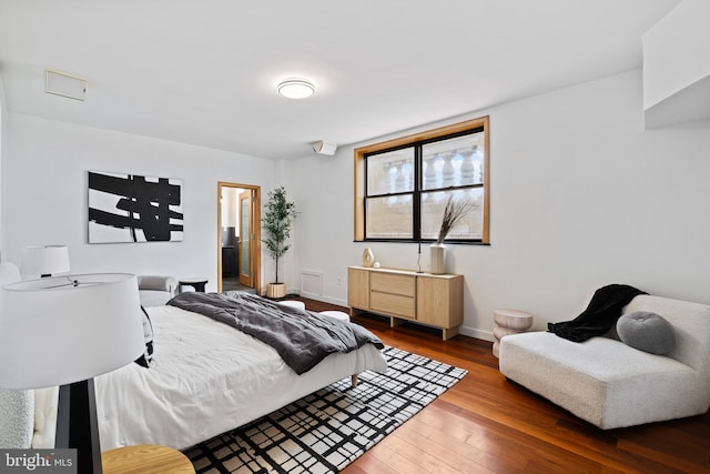 bedroom featuring wood-type flooring