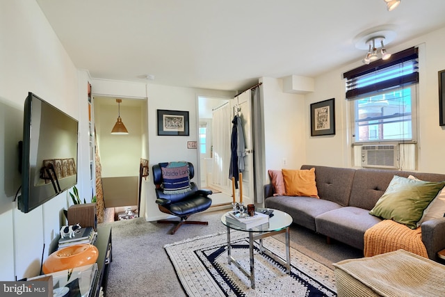 living room featuring carpet and cooling unit