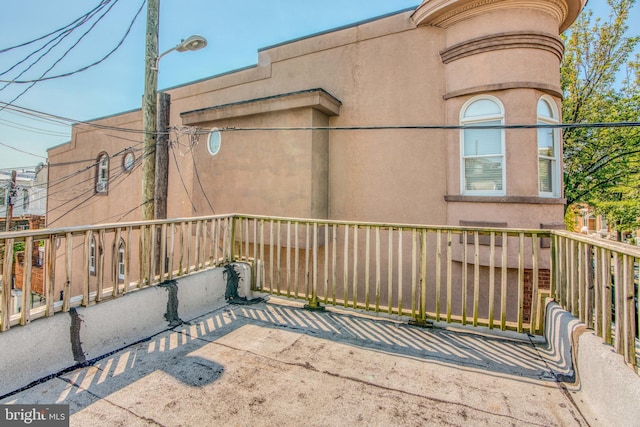 view of patio / terrace with a balcony