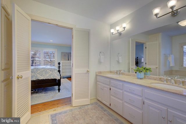 bathroom featuring vanity and wood-type flooring