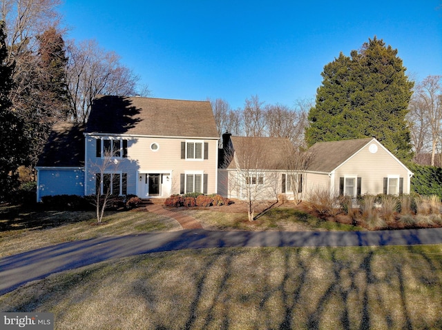 view of front of home with a front yard