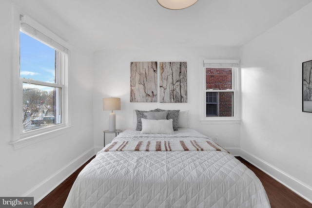 bedroom featuring dark wood-type flooring