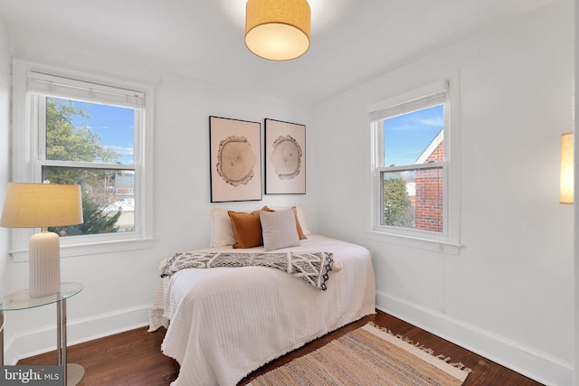 bedroom featuring dark hardwood / wood-style floors