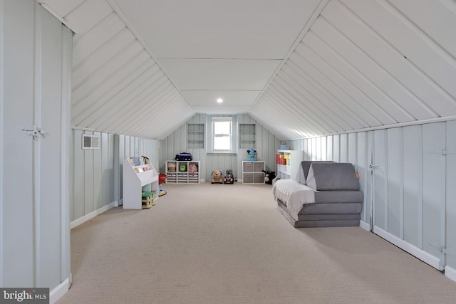 rec room featuring vaulted ceiling and carpet floors