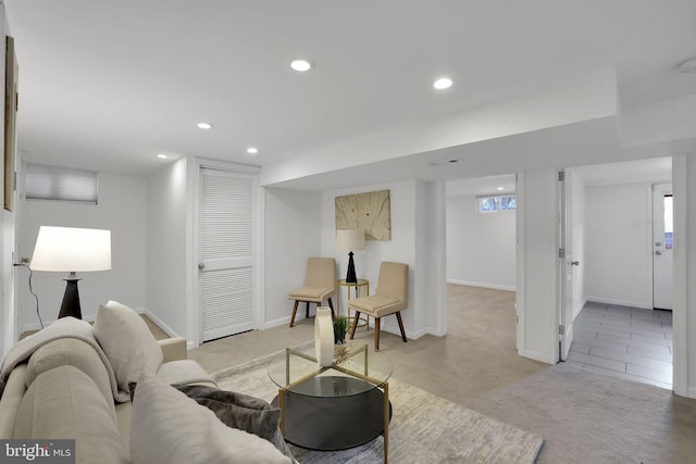 living room featuring light carpet