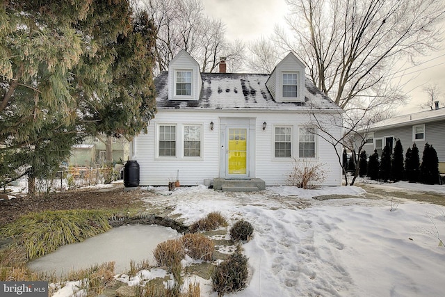 view of new england style home