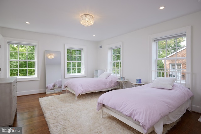 bedroom featuring dark hardwood / wood-style floors