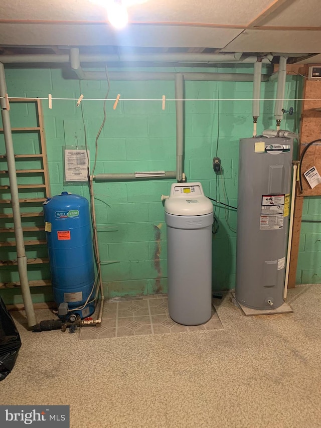 utility room featuring electric water heater