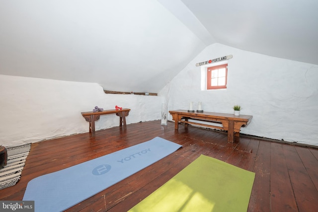 bonus room featuring lofted ceiling and dark hardwood / wood-style floors