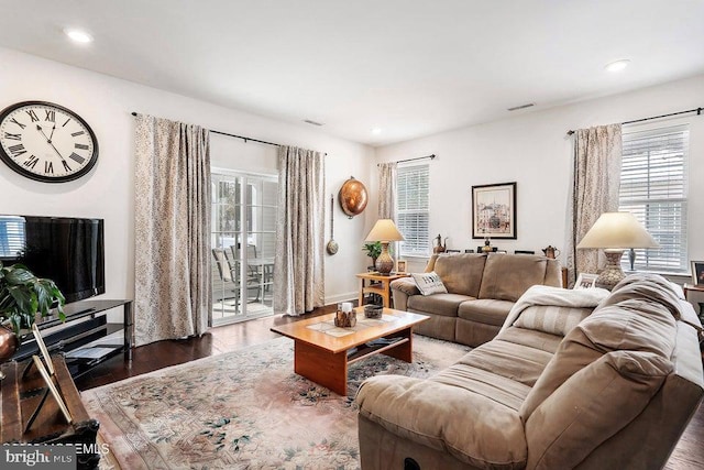 living room featuring dark hardwood / wood-style floors