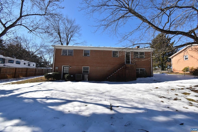 view of snow covered property