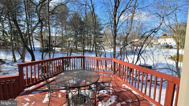 view of snow covered deck