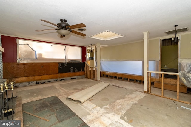 misc room featuring ceiling fan, ornamental molding, concrete flooring, and decorative columns