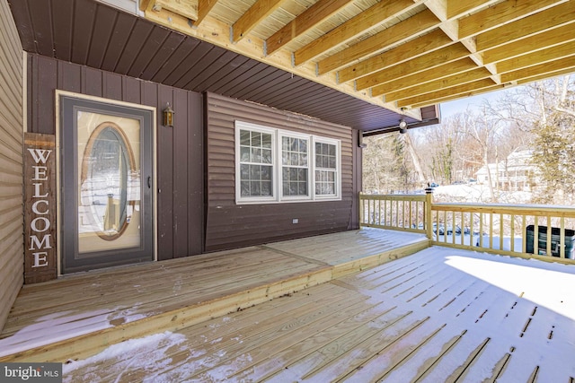 view of snow covered deck