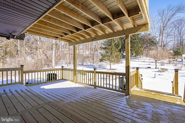 view of snow covered deck