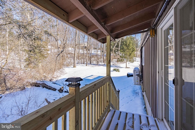 view of snow covered deck