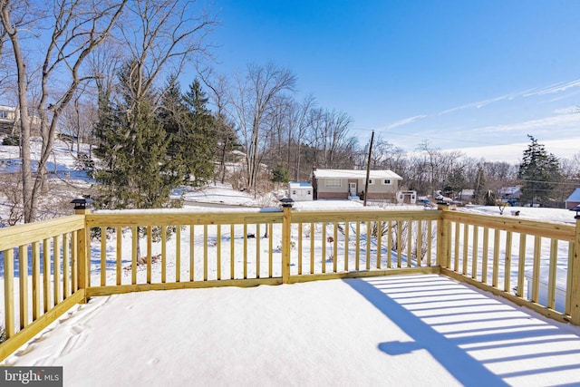 view of snow covered deck