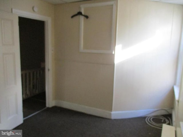 spare room featuring radiator