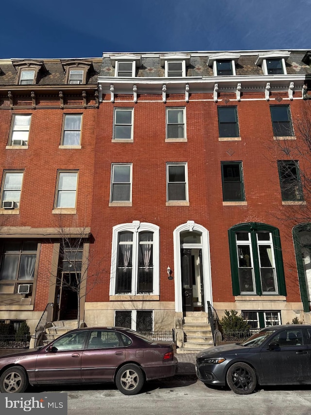 view of building exterior featuring cooling unit