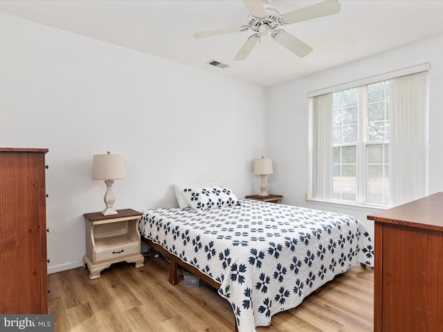 bedroom featuring ceiling fan and light wood-type flooring