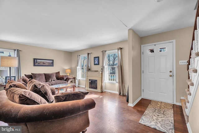 living room featuring dark wood-type flooring