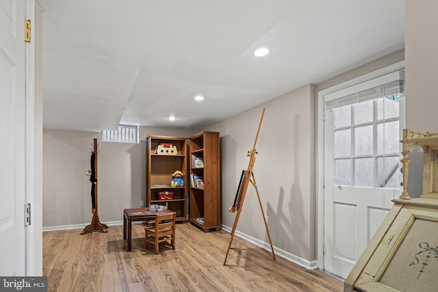 interior space with light hardwood / wood-style floors