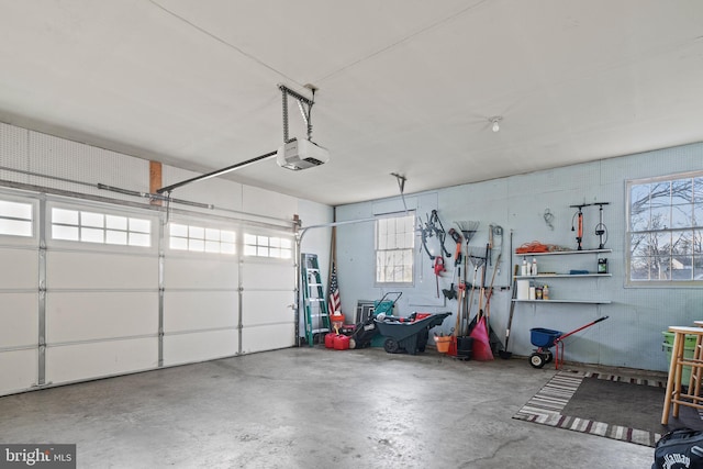 garage featuring a garage door opener