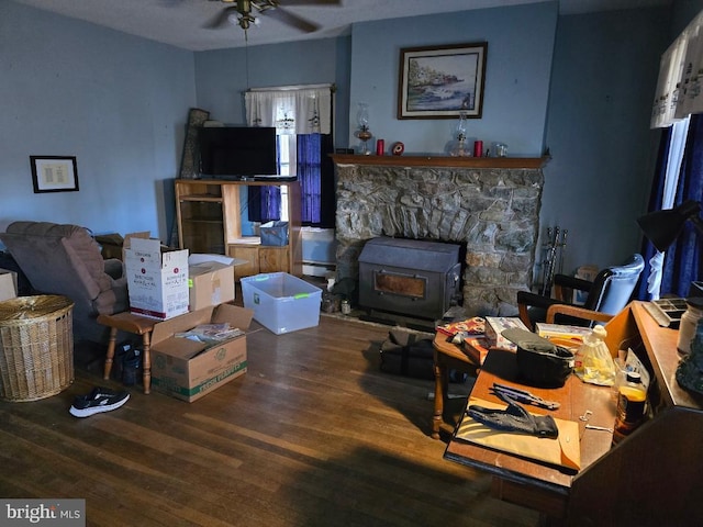 living room featuring ceiling fan and wood finished floors