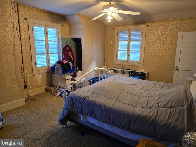 bedroom with ceiling fan and carpet flooring