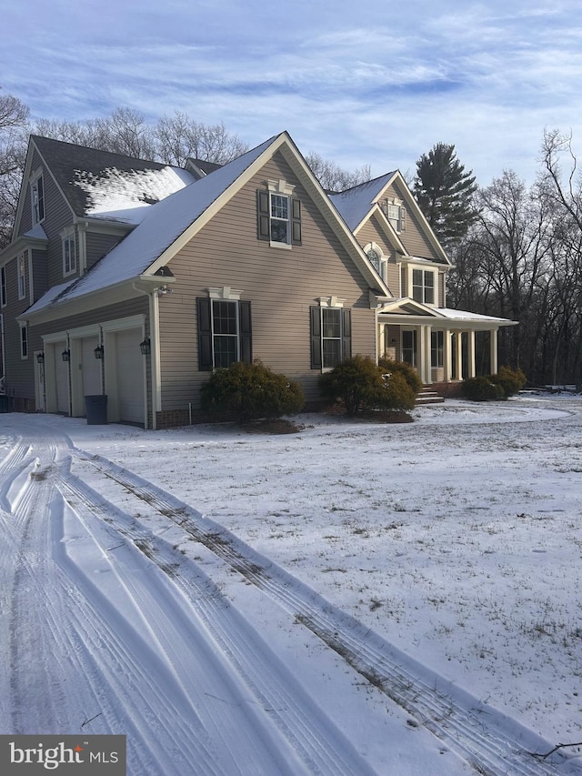 front of property with a garage