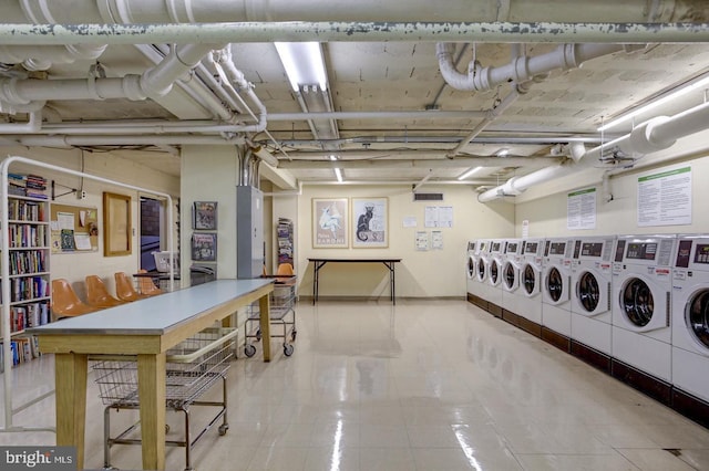 washroom featuring independent washer and dryer