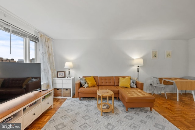 living room featuring light parquet floors