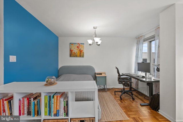 office area with a notable chandelier and light parquet floors