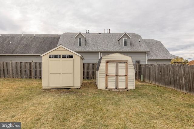 view of shed featuring a fenced backyard