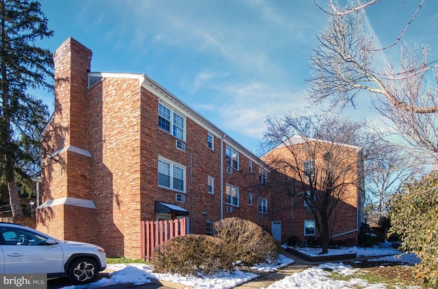 view of snow covered property