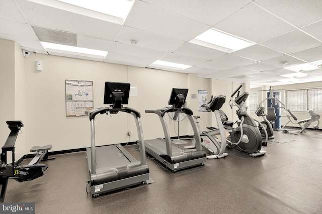 gym featuring a drop ceiling