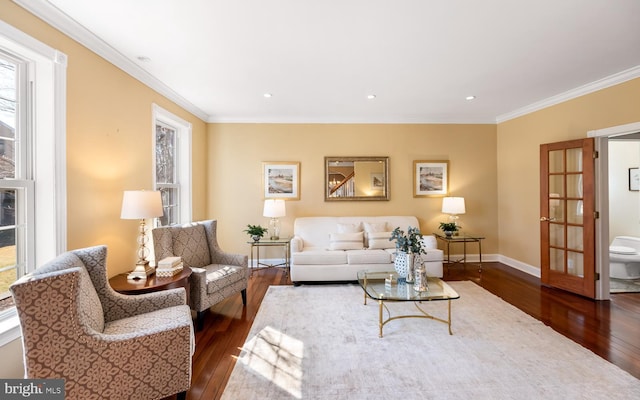 living room with ornamental molding, dark wood-type flooring, recessed lighting, and baseboards