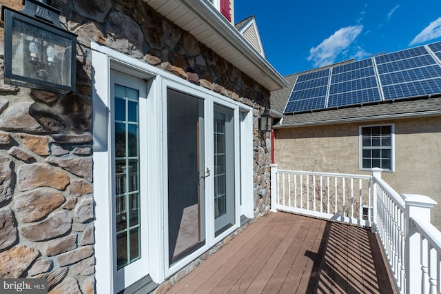 wooden deck with french doors