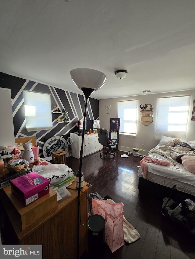 bedroom featuring dark wood-type flooring